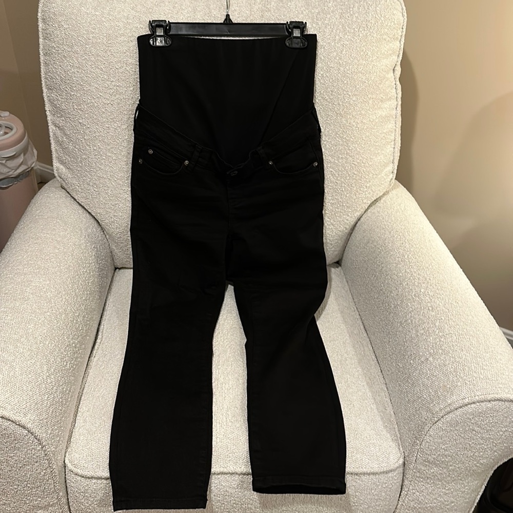 Gap Maternity jeans.  Over the belly.
.